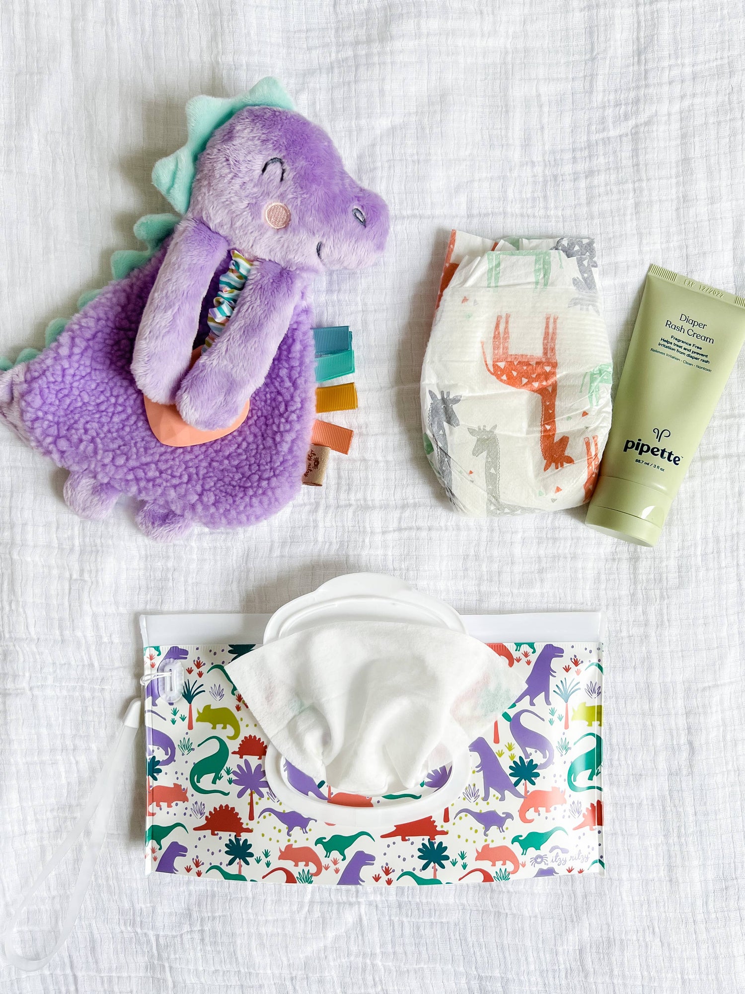 Take & Travel™ Pouch Reusable Wipes Cases Lilac Dino